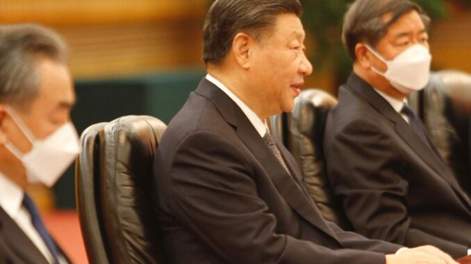 Xi