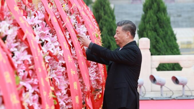 Xi